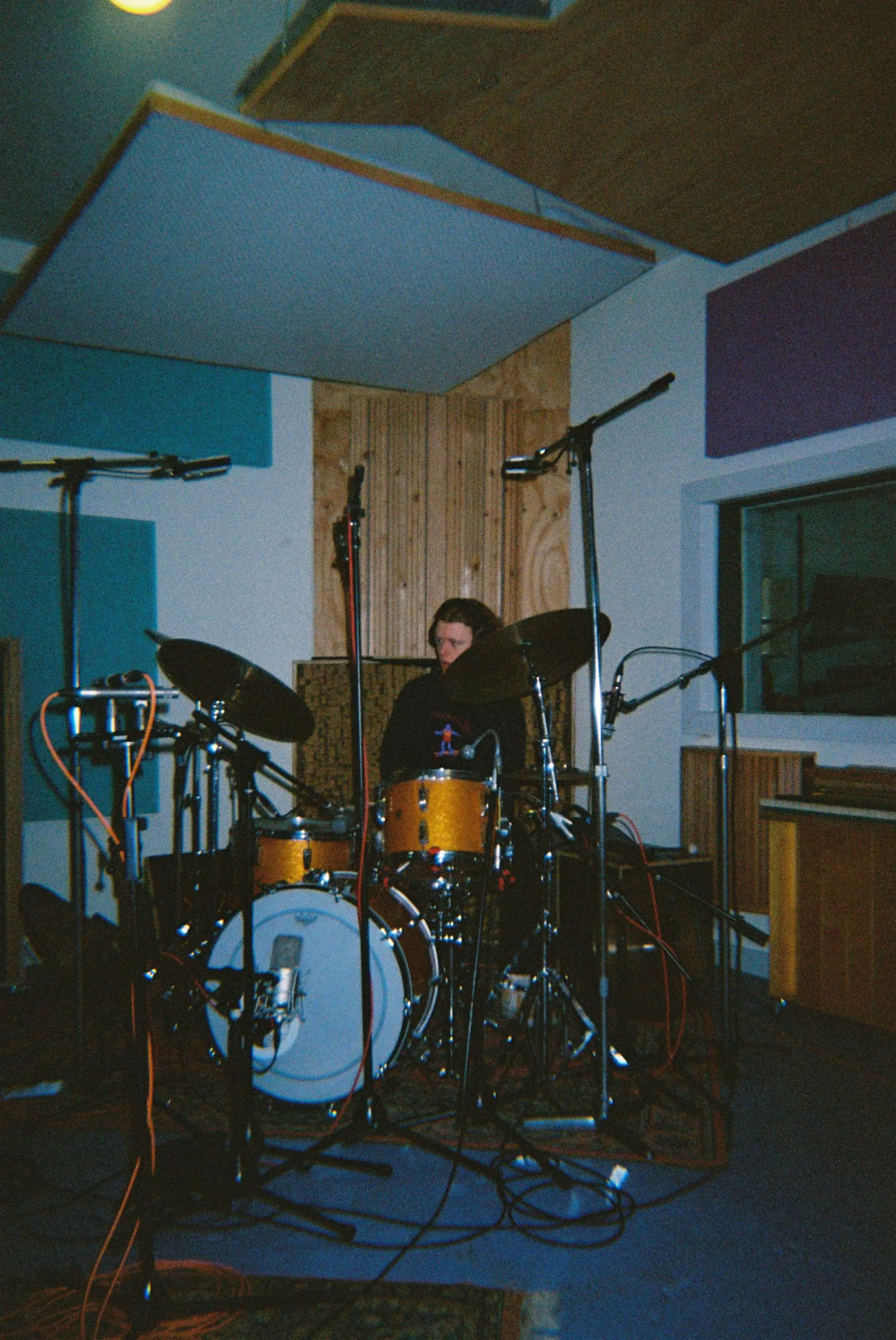 Iliya recording drums in a studio session